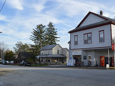 Cross east of Main, Palestine